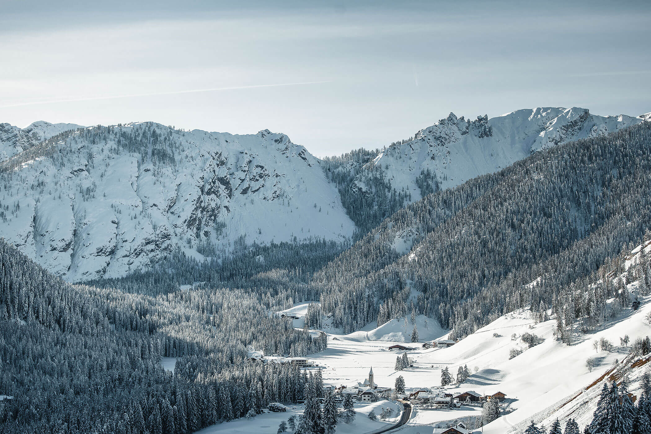 The South Tyrolean mountains and trees in winter - Hirschenhof