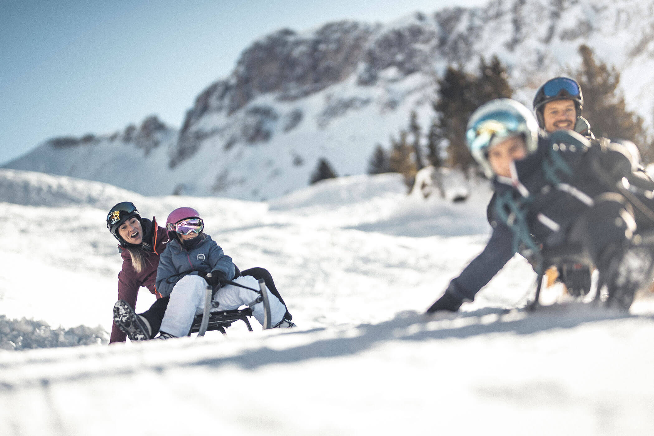 A family tobogganing - Hirschenhof